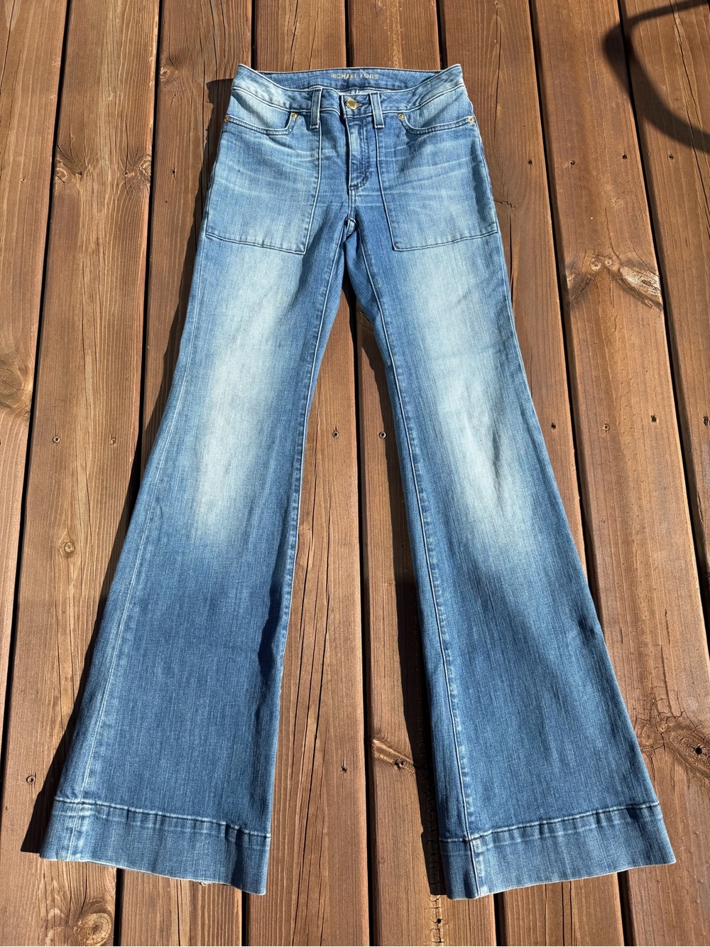 MICHAEL Michael Kors faded light blue wide leg flare jeans